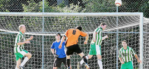 Well-saved: The Sawtell defence stop Tigers captain Dane Dixon getting his head on the end of this set play. Well-saved: The Sawtell defence stop Tigers captain Dane Dixon getting his head on the end of this set play.